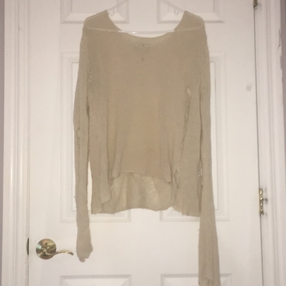Cream knitted distressed sweater